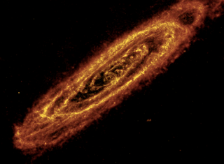 Illustration for article titled How three different types of light reveal the complete beauty of the Andromeda Galaxy